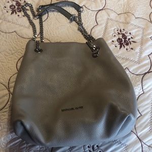 Gray double strap purse.